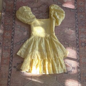 Altar'd State Pale Yellow Smocked mini dress perfect for tween girl